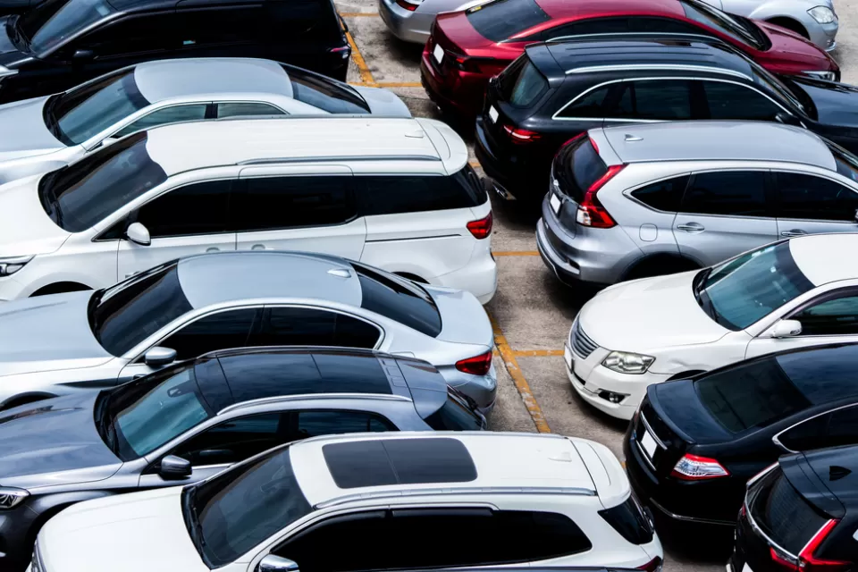 Outdoor parking lot full of cars
